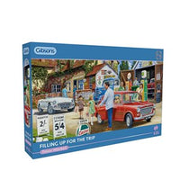 Puzzle - 636 pcs - Panoramic Collection: Fillling Up for the Trip (EN)