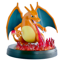 Charizard figurine with promos